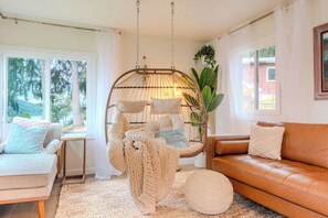 Relax in an egg chair, read a book or two, the entire space is yours. 
