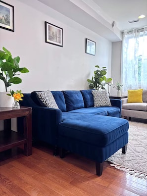 The living room has two couches to relax or take a comfy nap!