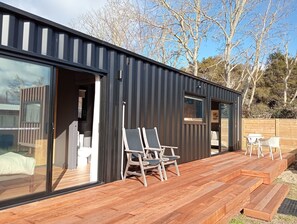 Indoor/outdoor flow from bedroom and living room.