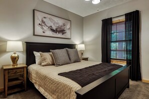 Sleep like royalty on the king-size bed in the master bedroom.