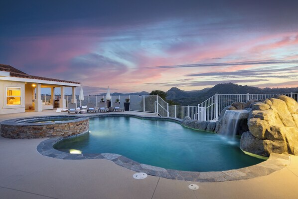 Enjoy panoramic views from your private pool and spa oasis.