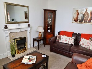 Furniture, Interior Design, Wall, Couch, Wood, Flooring, Living Room, Picture Frame, Room, Floor