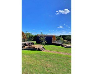 Shade, Mountain Range, Outdoor Structure, Eco Hotel, Deck, Outdoor Furniture, Garden, Chair, Landscaping, Hardwood