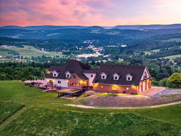 Welcome to TOP OF THE WORLD WELLSBORO, your private resort oasis that is secluded, luxurious, and has so many amenities you'll never even need to leave!