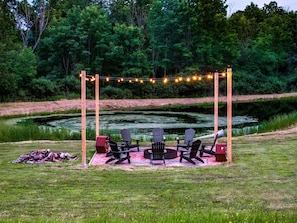 Hike down to your own private pond with huge 6 foot fire pit for some s'mores and evening tall tales!
