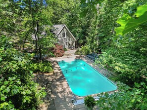 Welcome to Oasis in the Woods—your secluded spa + pool escape.
