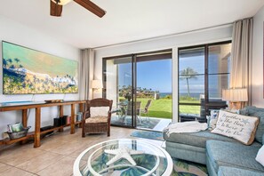 Inviting living area with coastal decor and natural light NAP-B13