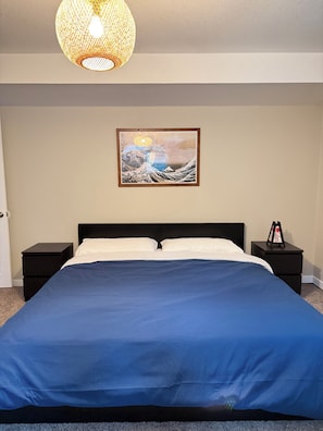 Enjoy a cozy night in this large, comfy king size bed.