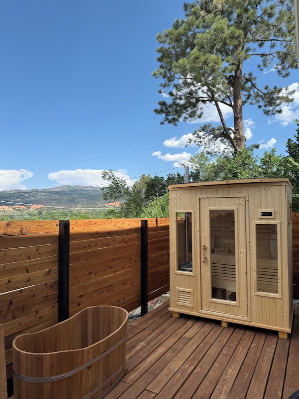 Relax in your private wood burning sauna and cool off in the teak cold plunge.