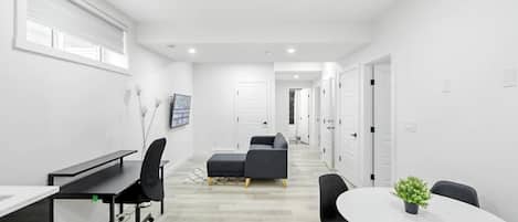 Open Concept suite features a cozy lounge area.