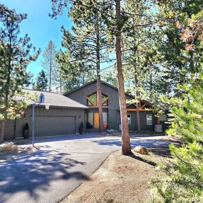 Front of house, showing basketball hoop.
