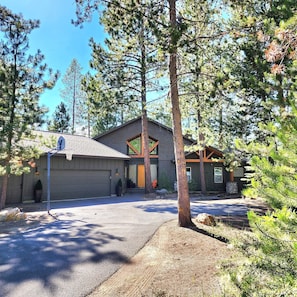 Front of house, showing basketball hoop.