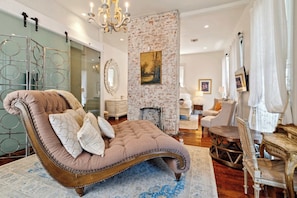 Lounge with Fireplace and Floor to Ceiling Windows in Bedroom 2