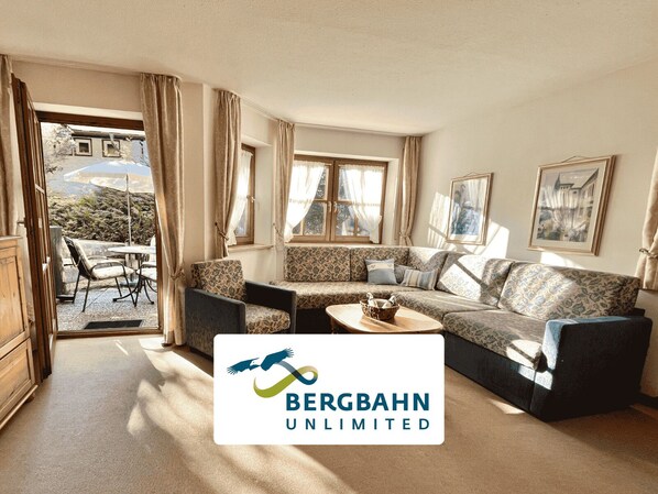 Living room with access to the terrace and garden