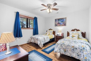 A pair of plush twin beds is available in the first bedroom