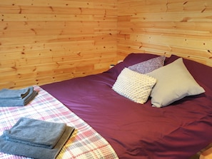 Double bedroom | Shepherds Hut Two - Island Hut Retreats, Rhosmeirch, near Benllech