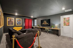 Watch your favorite movies in the theater room 