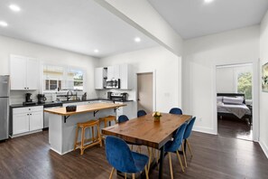 Welcome to the inviting dining room, conveniently located just off the kitchen — the perfect space to gather, share meals, and create memories with family and friends.