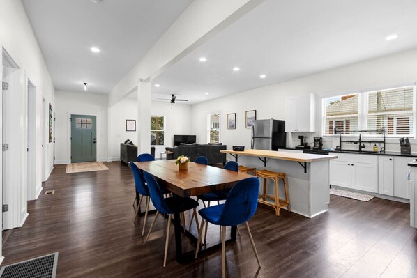 Welcome to the inviting dining room, conveniently located just off the kitchen — the perfect space to gather, share meals, and create memories with family and friends.