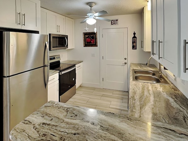 Fully Equipped Kitchen with Stainless Steel Appliances