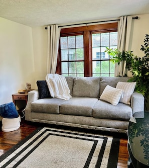 Living room with roomy sofa for extra sleeping; linens furnished