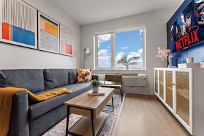 Living Room with Smart TV (stream Netflix, Hulu & more)