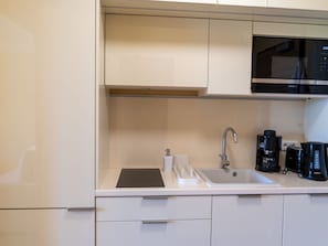 Kitchen, Countertop, Kitchen Appliance, Cabinetry, Interior Design, Major Appliance, Kitchen Sink, Sink, Flooring, Tap