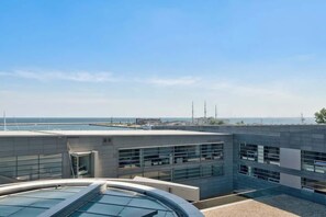 A breathtaking panoramic view of the marina, showcasing the beauty of the Bay of Gdańsk and its dynamic surroundings.