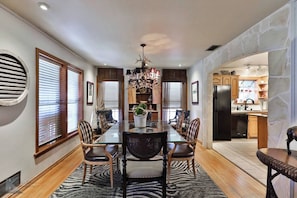 Seat up to 10 around this large dining table situated in the great room.