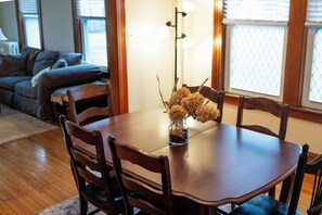 Dining room with table that expands to sit eight comfortably