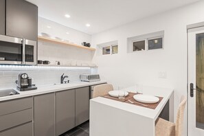 The Porcelanosa kitchen was installed in 2025. All kitchen essentials included.