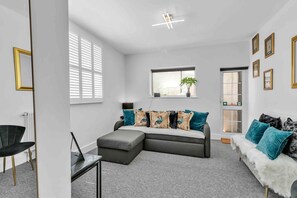 Double sofa bed in lounge area for additional guests