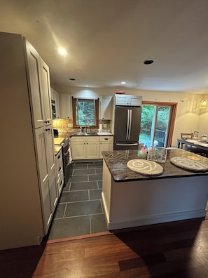 Newly remodeled kitchen with basic cooking supplies