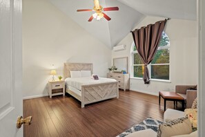 The primary bedroom features a queen bed and an ensuite bathroom.
