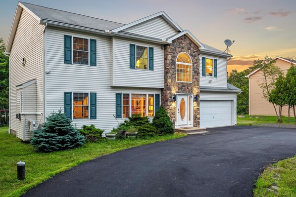 Welcome to your cozy home away from home—this charming exterior sets the tone for a warm and relaxing stay!