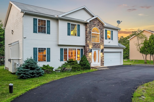 Welcome to your cozy home away from home—this charming exterior sets the tone for a warm and relaxing stay!