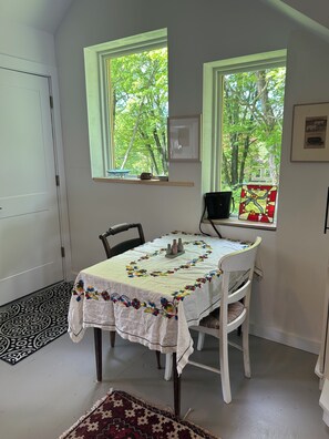 Small dining table with west view.