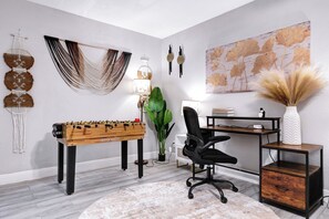 Need to get some work done? No problem! Want to have some fun, too? Well, you're in the right place! Enjoy our multi-game foosball table and stay productive at this comfortable desk.