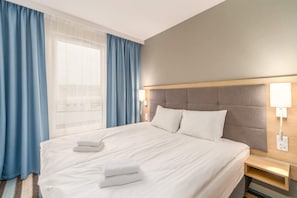 Cosy bedroom with comfortable bed.