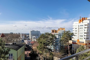 The view from the balcony overlooks the beautiful surroundings of the property.
