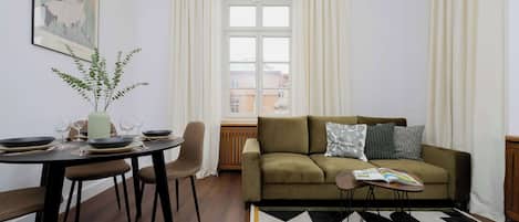 Living room with a comfortable sofa and TV.