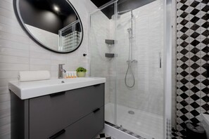 Comfortable bathroom with hairdryer. 