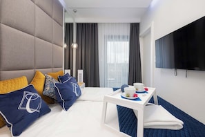 Comfortable double bed in the bedroom. 