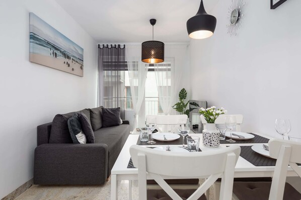 Living room with kitchenette.