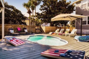 Private, Heated Pool (unlike nearby rentals, heating the pool is FREE!) with plenty of lounge seating + Gas Grill, Putting Green, and plenty of space for the kids to safely run around!