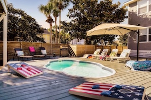 Private, Heated Pool (unlike nearby rentals, heating the pool is FREE!) with plenty of lounge seating + Gas Grill, Putting Green, and plenty of space for the kids to safely run around!