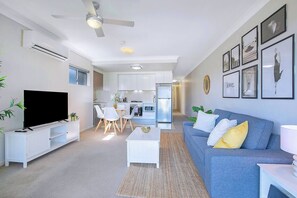 Get comfortable on the sofa. With air-conditioning to keep things cool and a TV for your evening entertainment.
