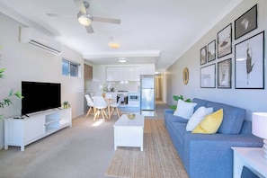 Get comfortable on the sofa. With air-conditioning to keep things cool and a TV for your evening entertainment.