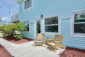 Entrance to unit, on side right of house
