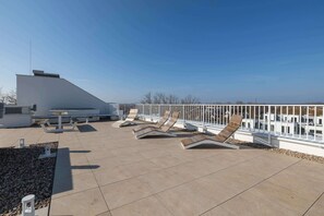 Enjoy the views from terrace in the common area.